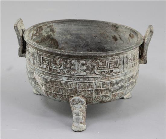 A Chinese archaic bronze tripod food vessel, Ding, probably Warring States period, 5th-2nd century B.C., 14.5cm, 9.5cm high, repair